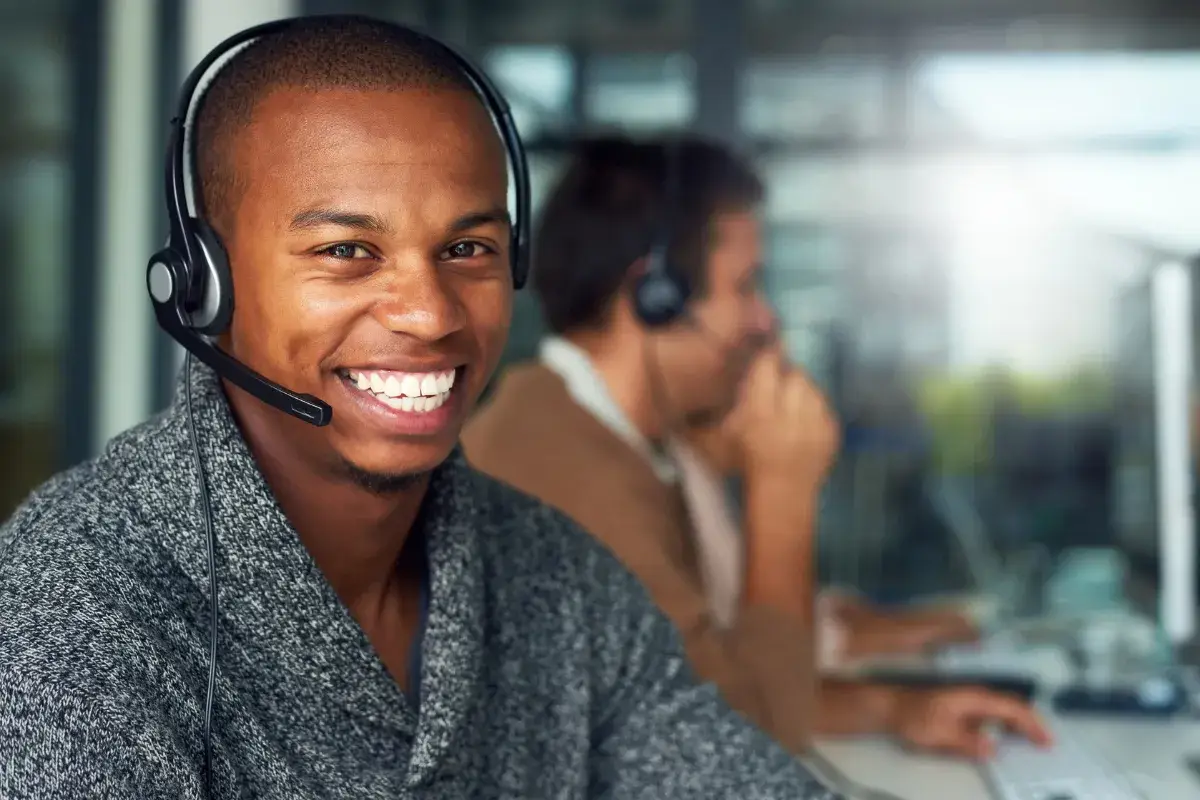 smiling man with work headset