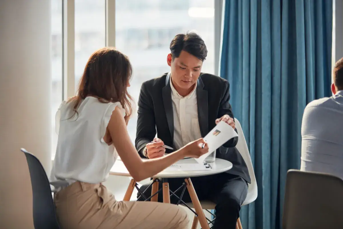 Profesionals going over reports