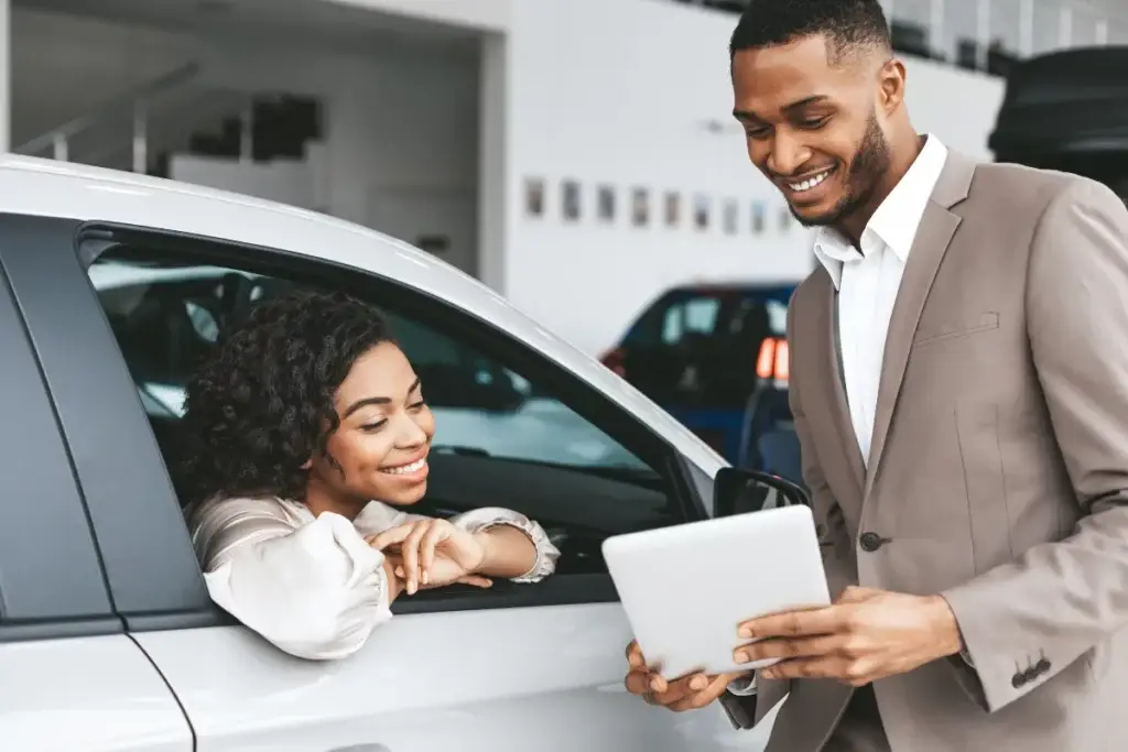 car salesperson closing deal by automating sales cycle stages