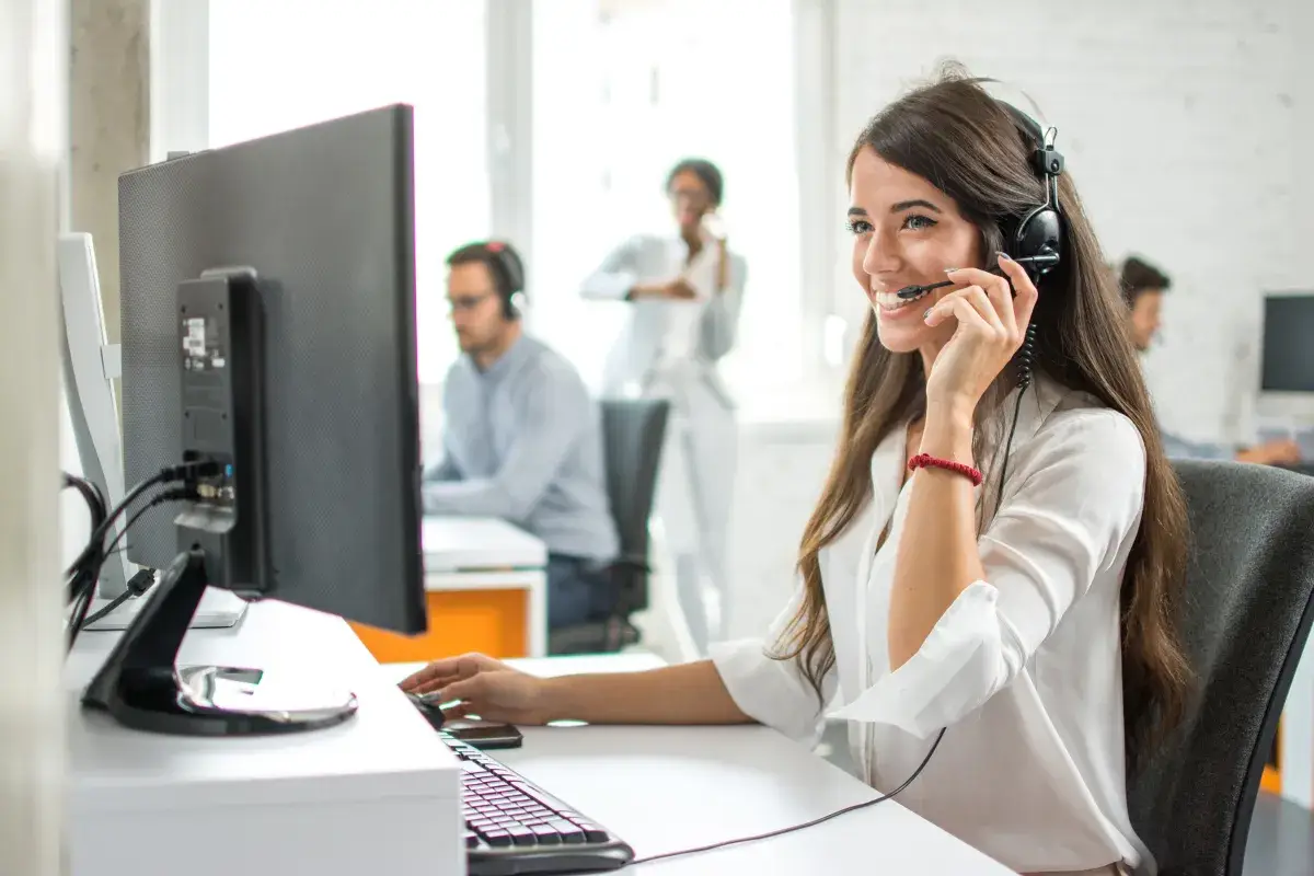 Sales Representitive at a desktop on a sales cal