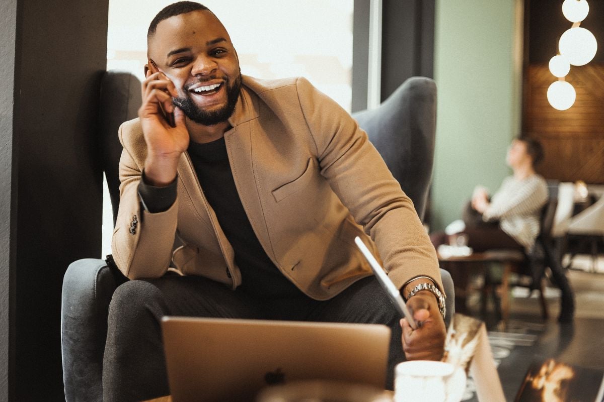 happy man using phone